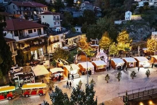 Lefkara Christmas Village wooden stalls and festive lights at night